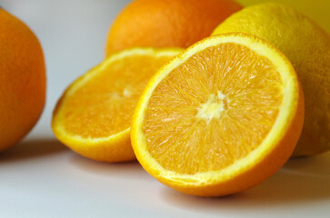 Sliced ​​oranges close up on white background