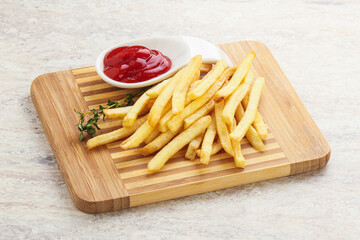 French fried potato over board