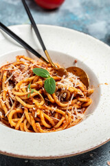 Pasta with meat, tomato sauce and vegetables, Italian pasta bolognese. banner, menu, recipe place for text, top view