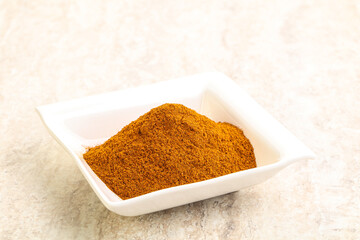 Dry Paprika powder in the bowl