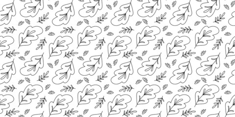 Black and white seamless textile pattern with leaves.