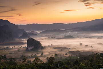 Sunrise and The Mist with Mountain Background , Landscape at Phu Langka, Payao Province, Thailand.