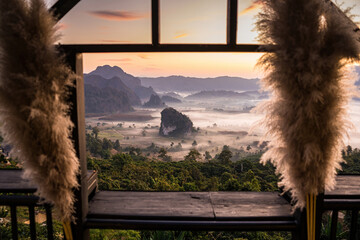 Sunrise and The Mist with Mountain Background , Landscape at Phu Langka, Payao Province, Thailand.
