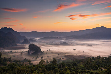 Sunrise and The Mist with Mountain Background , Landscape at Phu Langka, Payao Province, Thailand.