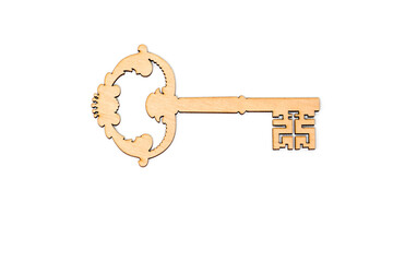 Wooden cut key with pattern isolated on white background.