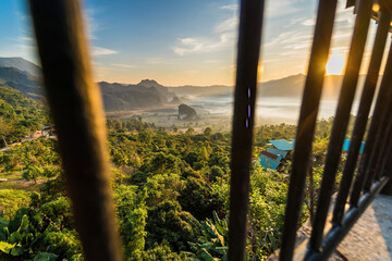 Fototapeta premium Sunrise and The Mist with Mountain Background , Landscape at Phu Langka, Payao Province, Thailand.