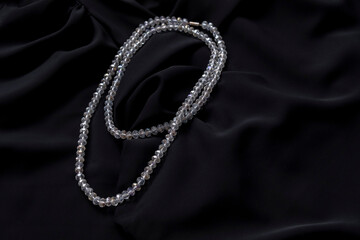 Crystal necklace on black silk. Jewerely store.