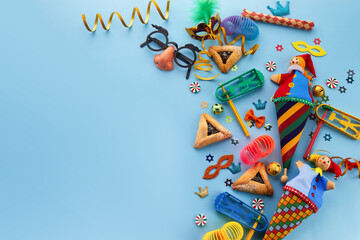 Purim, jewish carnival holiday celebration background. Top view, flat lay - obrazy, fototapety, plakaty