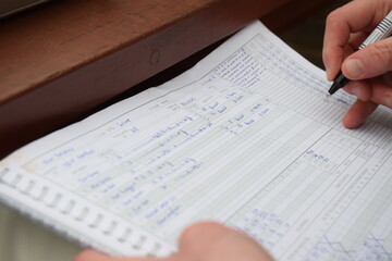 Obraz premium Cricket scorebook