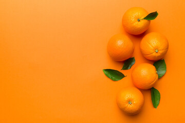 fresh Fruit orange slices on colored background. Top view. Copy Space. creative summer concept. Half of citrus in minimal flat lay with copy space
