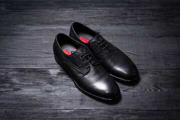 black classic men's shoes on a dark background
