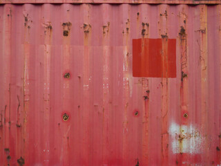 Rusty metal texture of reddish container. Rust old zinc wall texture and background. Old metallic background.