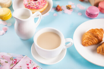 Obraz na płótnie Canvas Cup of tea and fresh baked croissants. Healthy lifestyle concept. Romantic style.