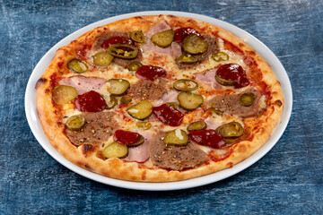 fresh pizza on the white plate