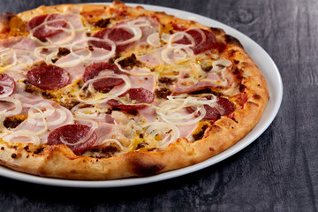 fresh pizza on the white plate