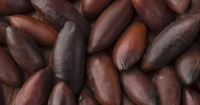 Closeup top view of baru nuts. Food backdrop