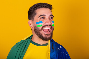 Brazilian man, latin american, cheering for brazil, 2022 world cup, patriot, nationalist, screaming...