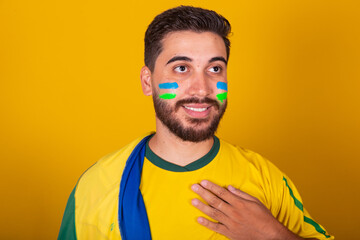 Brazilian man, latin american, cheering for brazil, in the 2022 world cup, Patriot, nationalist,...