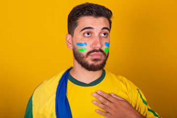 Brazilian man, latin american, cheering for brazil, in the 2022 world cup, Patriot, nationalist,...
