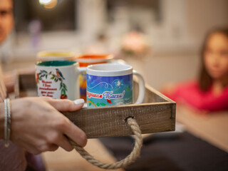 person holding a cup of tea