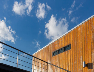 wooden building perspectively with white cloud and lighting sky