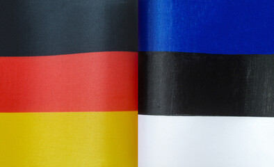 fragments of the national flags of Germany and Estonia in close-up