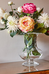 Flower vase and apartment hotel room keys. Still life