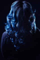blue hair woman head backside on black background