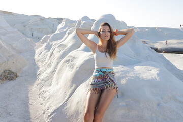 model in a bikini on the beach in milos sarakiniko