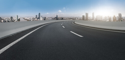 Fototapeta premium Freeway skyline and financial district modern buildings
