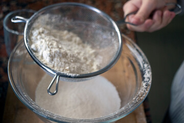 mixing flour in a bowl