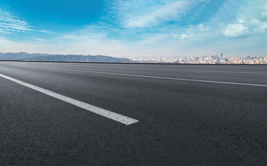 Fototapeta premium Freeway skyline and financial district modern buildings