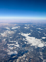 Aerial view of mountains in winter snow in southwest USA