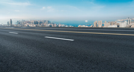Fototapeta premium Freeway skyline and financial district modern buildings