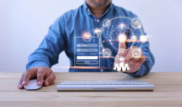 Cyber data protection, data privacy, Businessman scan fingerprints to login security, and enter password to access private data and prevent identity theft. Technology internet online digital.