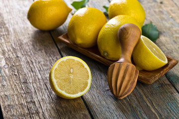 Lemons and squeezer.