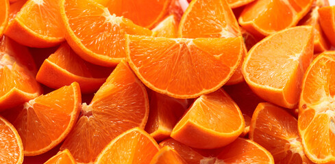 Cut ripe tangerines.