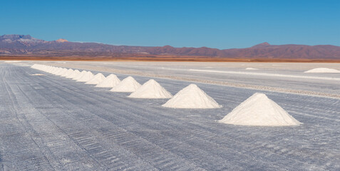 Salt pyramids in the Uyuni salt flat desert near the town of Colchani, Potosi department, Bolivia.