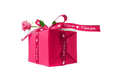 Gift box wrapped in a red paper with rose flower isolated on a white