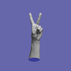 Female hand showing a peace gesture isolated on a very peri color background. Trendy abstact collage in magazine urban style. Contemporary art. Modern design. Victory hand sign	