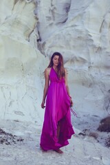 women in a pink dress in milos greece model shooting 