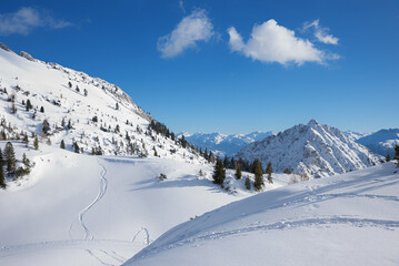 Fototapeta na wymiar beautiful winter landscape in skiing and hiking area rofan mountains, austria. with some snow tracks