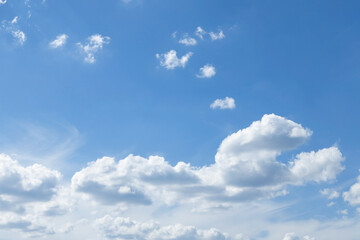 Naklejka na ściany i meble Cumulus white clouds floating on blue sky in beautiful day