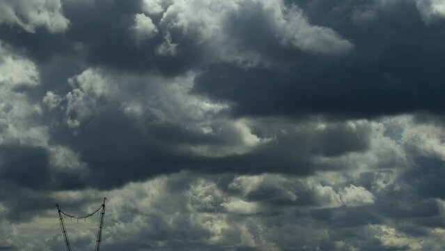 big cumulus thunderclouds on a sunny day, desktop screensaver, time lapse