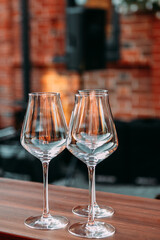 wine glasses on a summer evening on the terrace. romantic evening