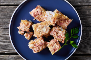 meat aspic, jellied slow cooked meat on a plate