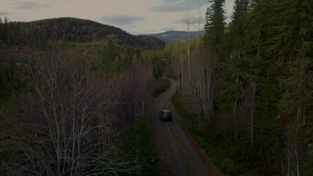 Land Rover Driving off into the Norwegian mountains 4K Drone