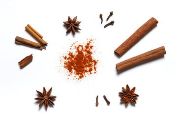 Spices anise, clove, paprika, cinnamon on white background.