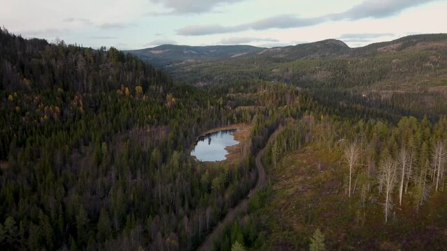 Lake Bjortjonn Norway Land Rover Mountain Road Cruising 4K Drone