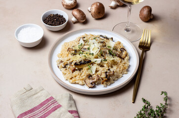 Risotto with mushrooms, cheese and thyme. Vegetarian food. Italian food.